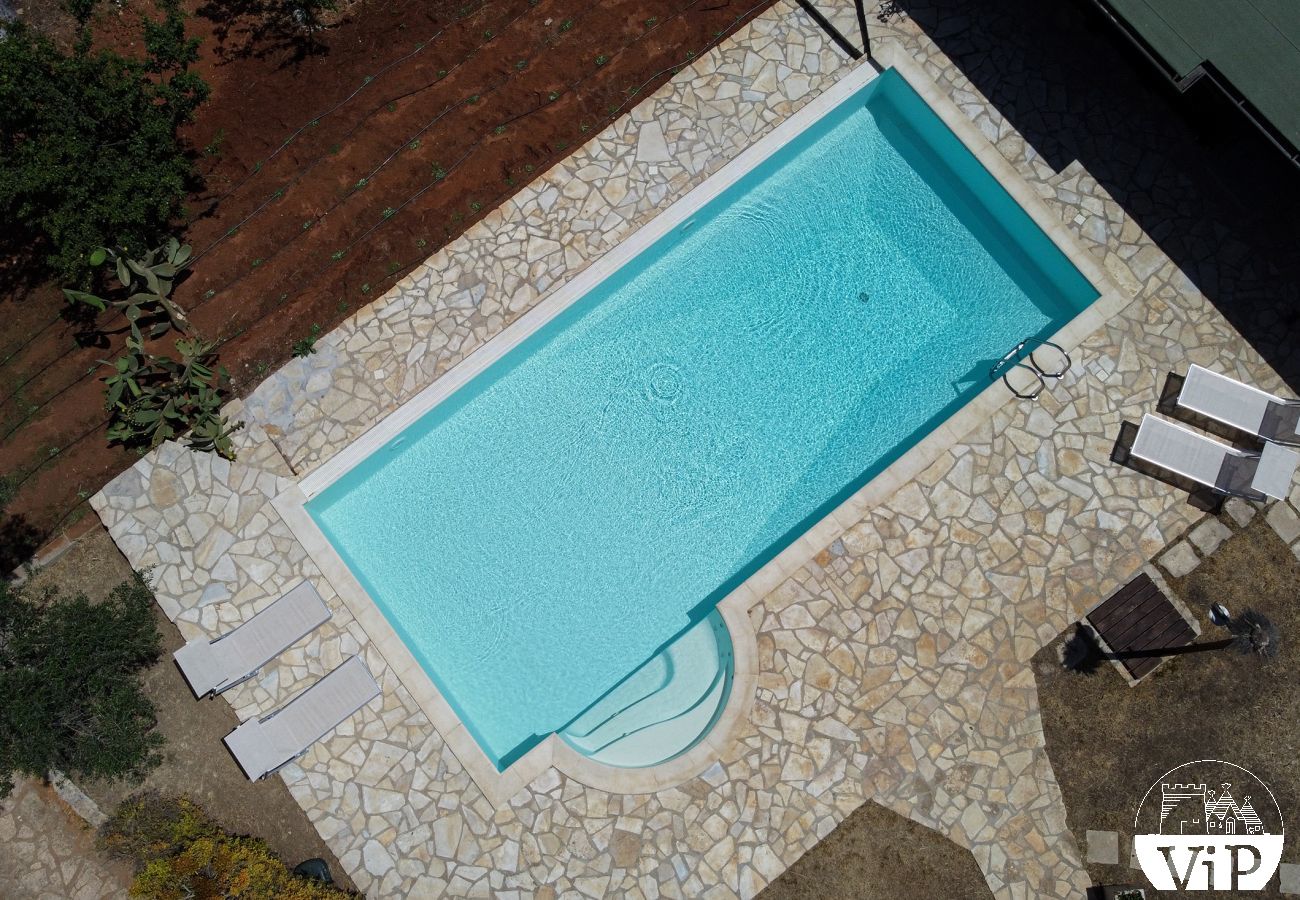 Villa à Collemeto - Villa avec piscine, 5 chambres, 3 salles de bains, barbecue, lave-linge, connexion WiFi, climatisation m565